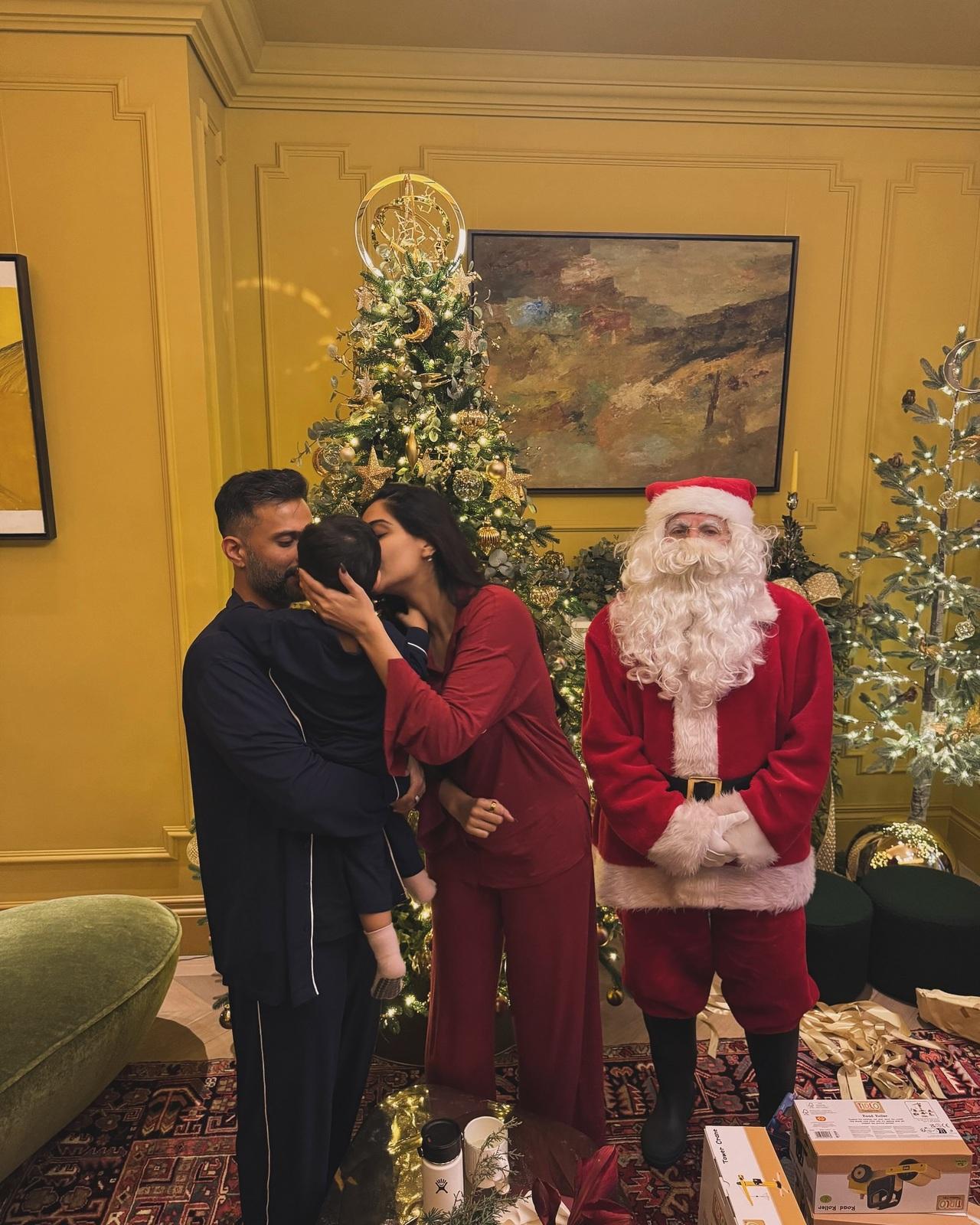 Sonam Kapoor celebrated Christmas with fervour and pomp in presence of Vayu and Anand. While the mom beams with joy, Vayu is seen twinning in blue with his blue.